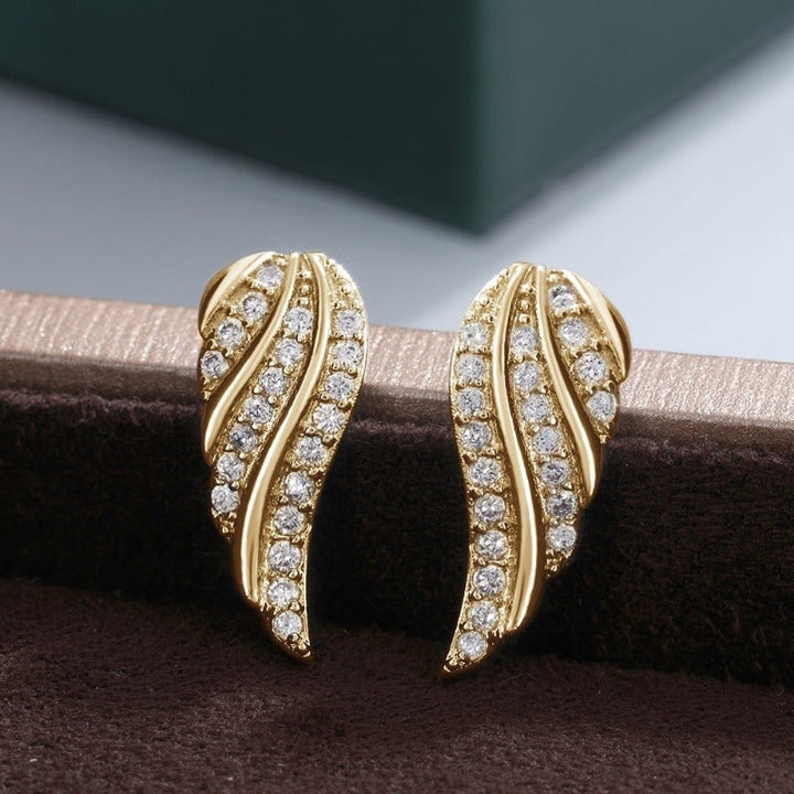 Nowoczesne kolczyki Leaf Pave — złote