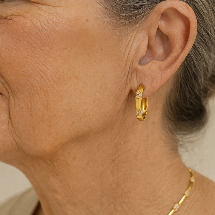 Kolczyki koła vintage ze złotym kwiatem